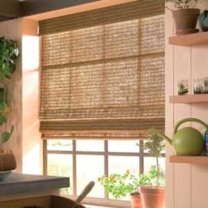Kitchen with bamboo shades on window, creating a warm and cozy atmosphere.